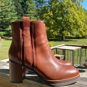 Clarks heeled tan leather ankle boots.